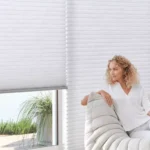 living room with hunterdouglas duette shades